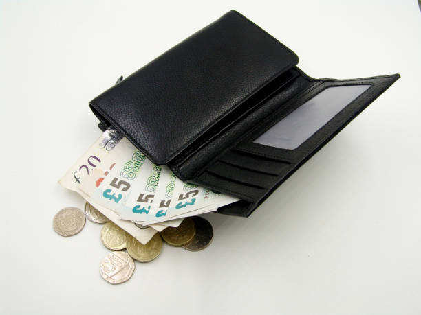 istock Black purse with British money 838474468