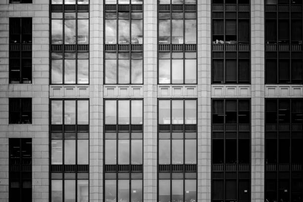 istock Modern office building detail, glass surface with B&W color 838475852