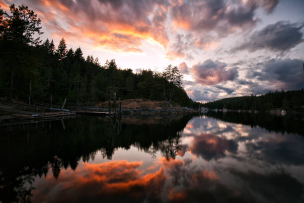 Marina at sunset, Sunshine Coast, BC , Canada Marina at sunset near Halfmoon Bay. shadow british columbia landscape cloudscape stock pictures, royalty-free photos & images