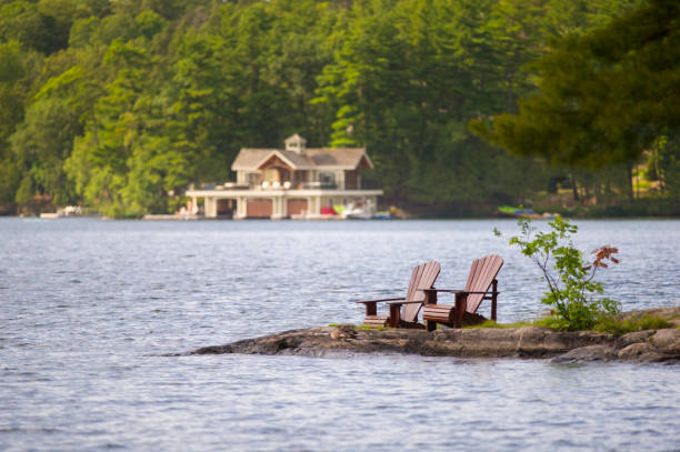 Muskoka chairs on a rock formation