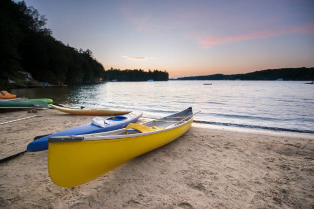 istock Cottage sandy beach on a lake at dusk 838477606
