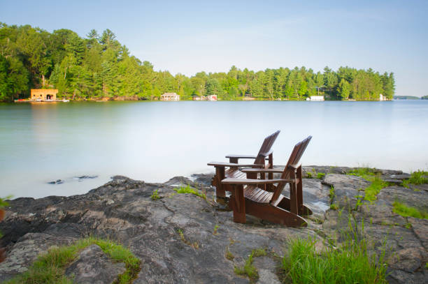 istock Muskoka chairs on a rock formation 838477880