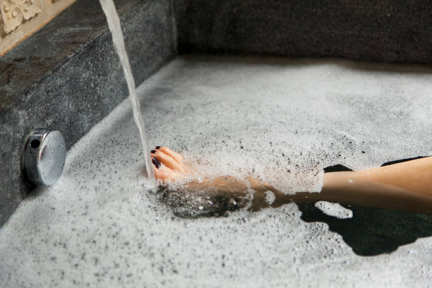 istock woman leg in a bathtub 838479942