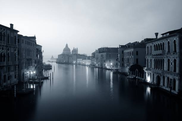 istock Venice Grand Canal sunrise and boat 838480510