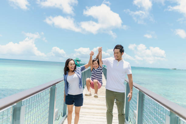 Japanese family walking bridge with smile