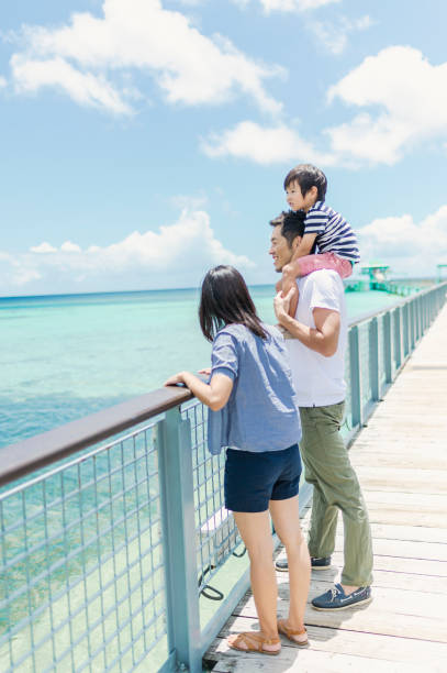 istock Japanese family walking bridge with smile 838486172
