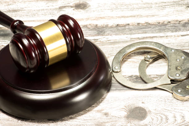 istock A judge's hammer and handcuffs 838486548