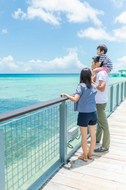 istock Japanese family looking the sea 838486682