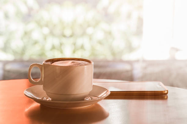istock Cup of hot coffee on wood table 838490766