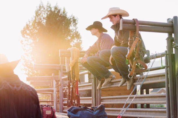 istock Young cowboys sat around talking before a rodeo 838491804