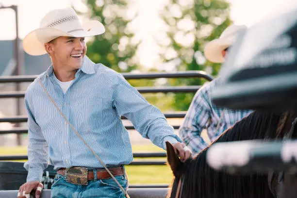 Photo of Smiling young cowboy