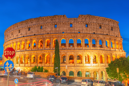 Rome, Italy -May 10, 2017: Beautiful landscape of the Colosseum in Rome- one of wonders of the world  in the evening time. Italy.