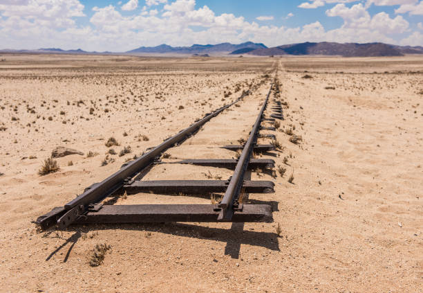 Abandoned railway tracks in the desert, Namibia Abandoned railway tracks in the desert, Namibia end of the line stock pictures, royalty-free photos & images