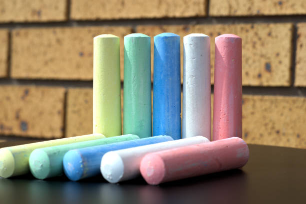 istock Ten chalks of different colors on table in pair. 838494580