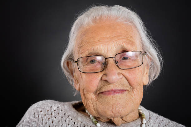 istock Smiling Senior Woman With Eyeglasses 838496574
