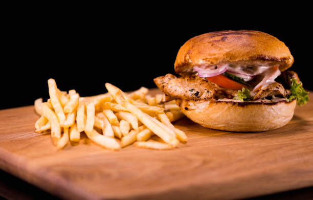 istock Fresh grilled Chicken Burger with fries 838498632