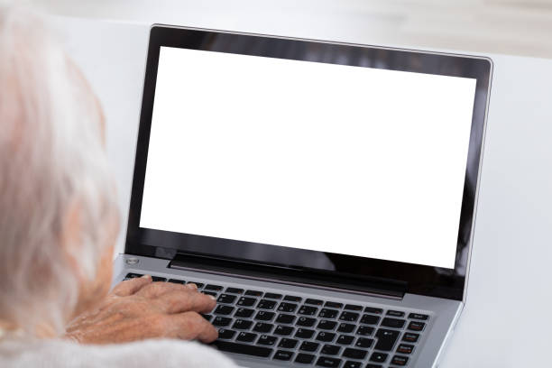 istock Close-up Of Senior Woman Using Laptop 838501166