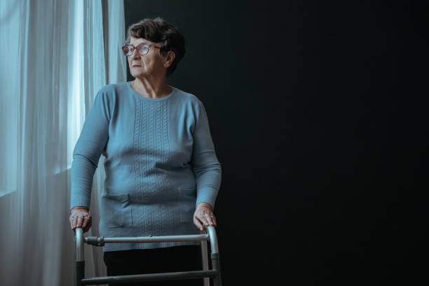 istock Woman standing with a walker 838502042