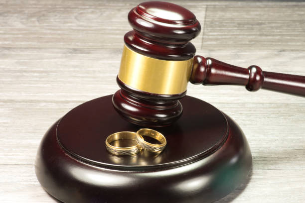 istock A judge's hammer and wedding rings 838506032