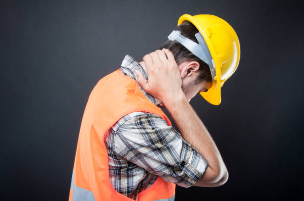 istock Side view of constructor holding neck like hurting 838506268