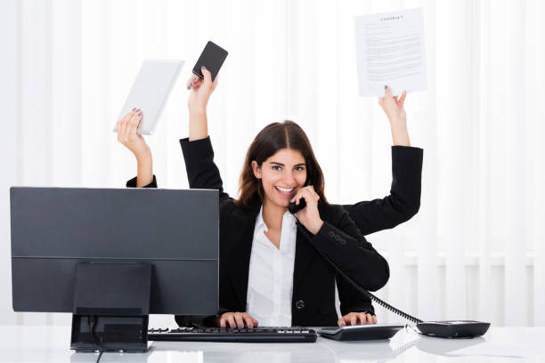 istock Busy Businesswoman Multitasking 838506496
