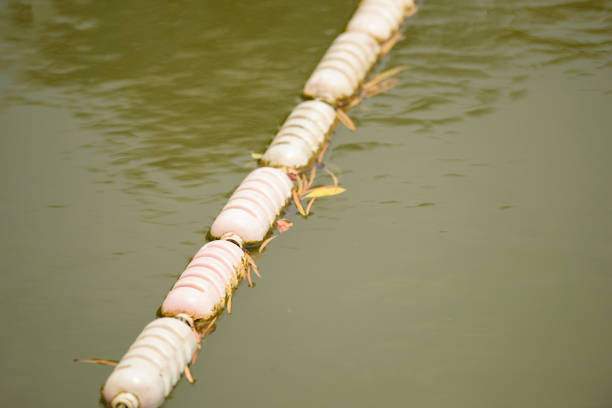 Boundary mark floats on sea water's surface Distance Sign, Equipment, Hazard Sign, Poolside, Rope swimming pool lane ropes stock pictures, royalty-free photos & images