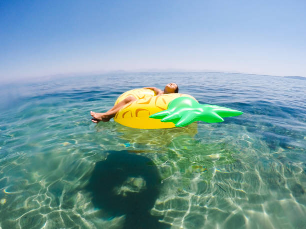 istock Relaxing on a inflatable beach mattress 838507532