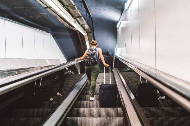 istock Woman walking up the stairs 838510166