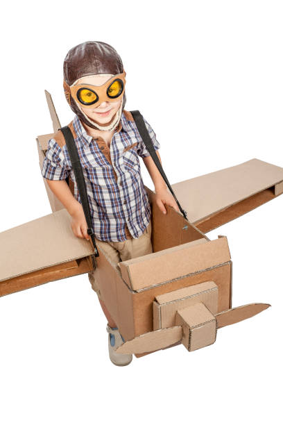 istock child with cardboard airplane 838511076