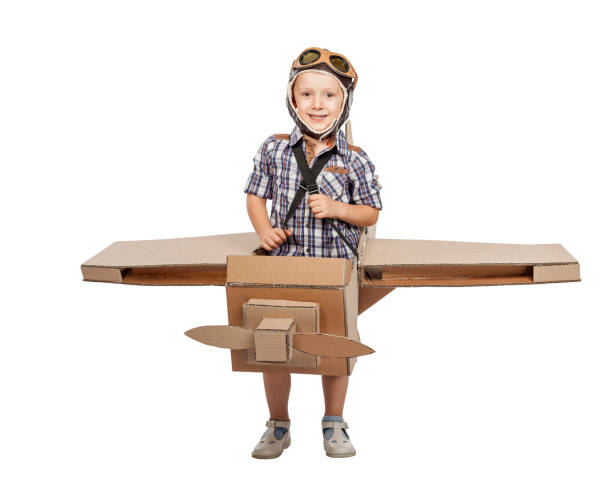 istock child with cardboard airplane 838511218