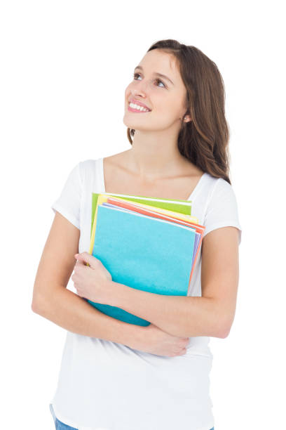 istock Smiling female college student holding books 838511948