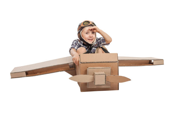 istock child with cardboard airplane 838513120
