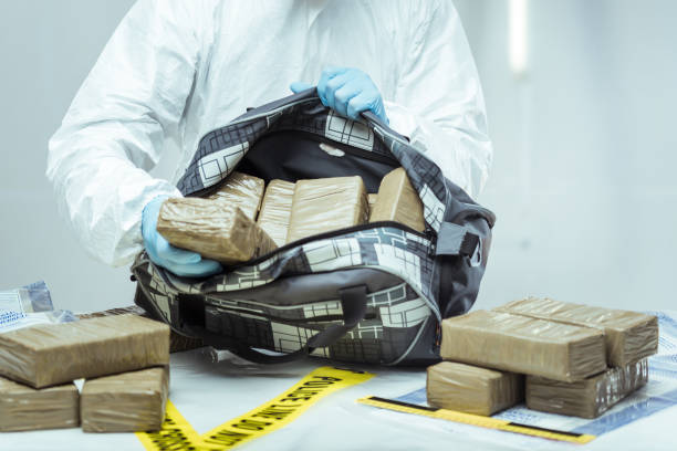Drug smuggling Packages of narcotics in car tire. Drug smuggling. narcotic stock pictures, royalty-free photos & images