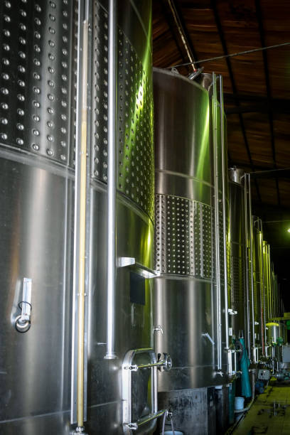 istock metal wine barrels in a winery 838520364