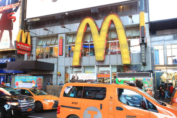 time square mcdonald New York, USA October 4, 2016: one of he McDonald restaurant at night in New York time square. Mcdonald is one of biggest fastfood restaurant in the world new york marathon photos stock pictures, royalty-free photos & images