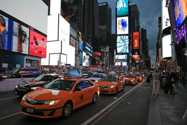 time square New York, USA - October 4 2016: the crowd in time square at night in New York . time square is the most popular landmark and nightlife area in new york new york marathon photos stock pictures, royalty-free photos & images