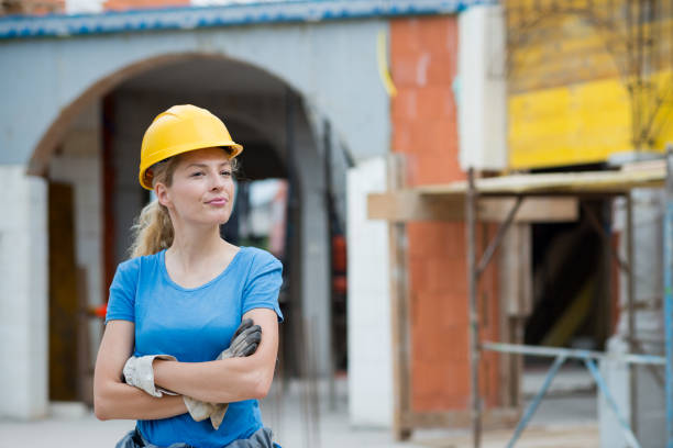 istock Portrait of young manual worker on construction site 838524432
