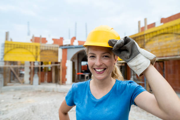 istock Portrait of young manual worker on construction site 838524440