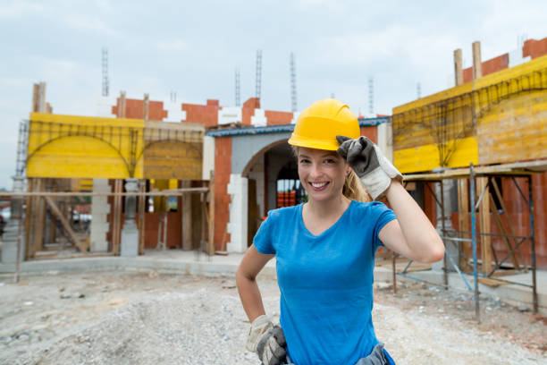istock Portrait of young manual worker on construction site 838524480