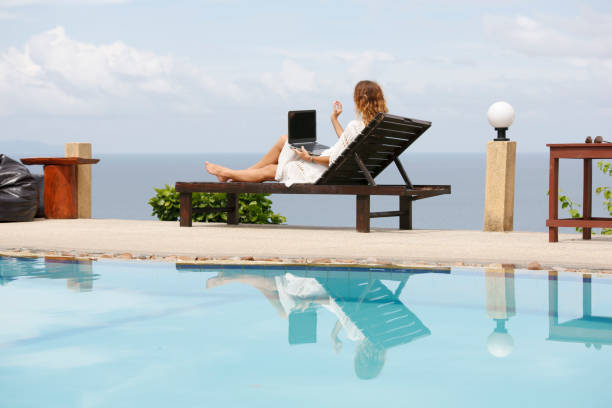 istock Work At Beach. Successful Business Woman Working Online In Internet Using Laptop Computer Outdoors. 838524700