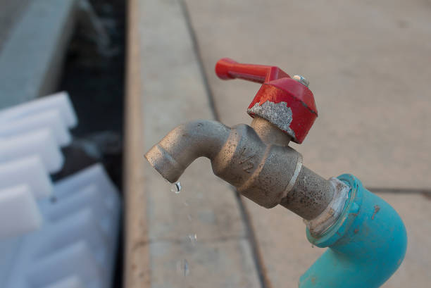 istock Wasting water - water drop from water tap 838527198