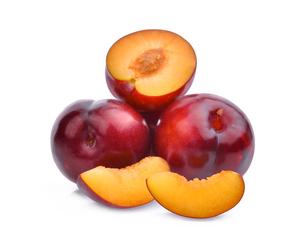 istock whole and half with slice of red cherry plums isolated on white background 838530864
