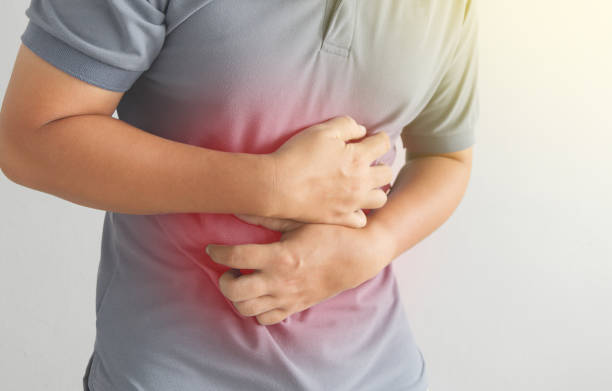 мужская боль в животе - peptic ulcer стоковые фото и изображения