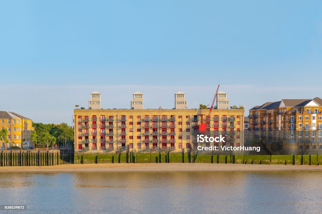 Riverside apartment converted from a former Victorian warehouse in London Riverside apartment converted from a former Victorian warehouse in London, UK Apartment Stock Photo