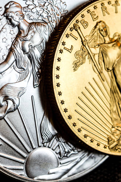 istock silver eagle and golden american eagle one ounce coins 838543890
