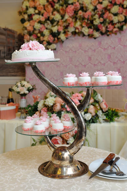 istock Wedding cake and cupcakes on a beautiful stand 838545010