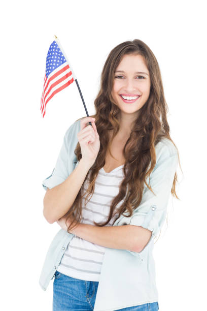 istock Female student holding american flag 838546028
