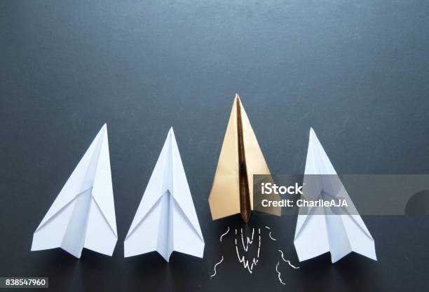 Paper Plane Leadership Concept Stock Photo - Download Image Now - Standing Out From The Crowd, Individuality, Achievement