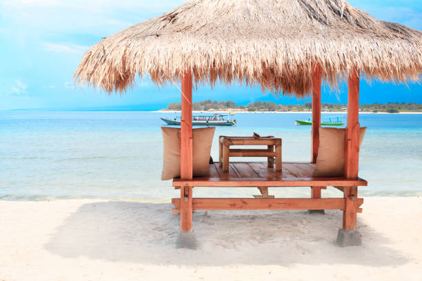 istock Wooden terrace on the beach. Gili. 838552252