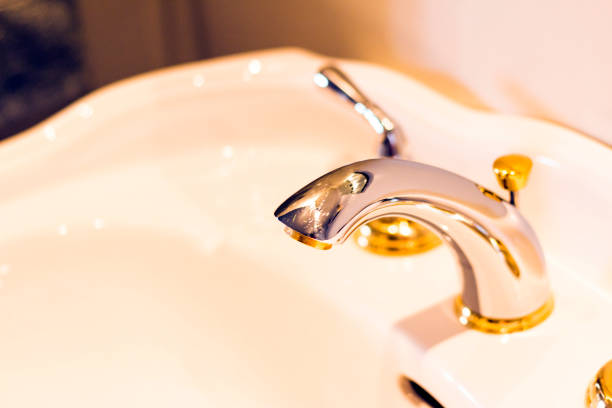 istock Silver and gold faucet 838555040